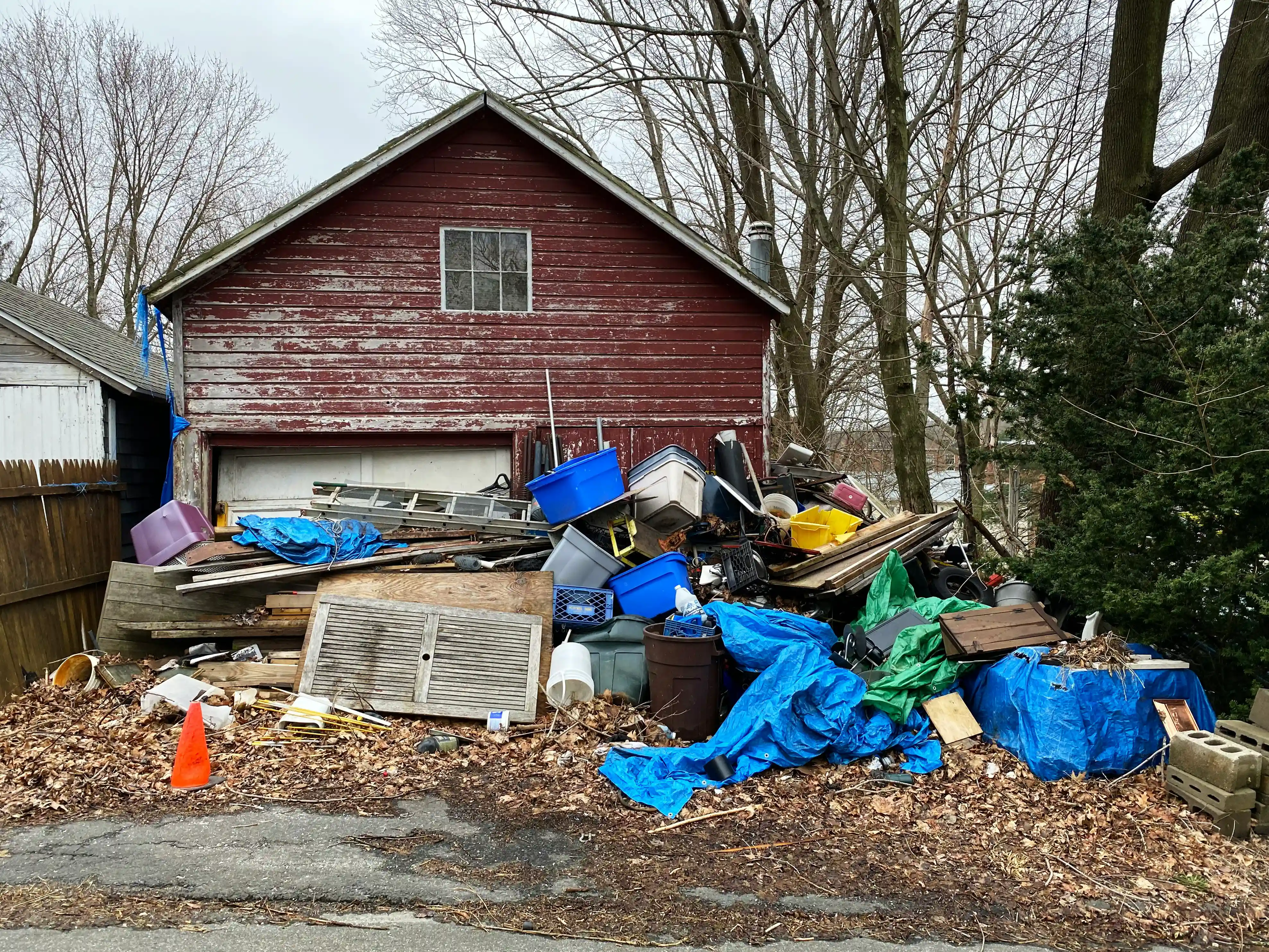 Junk removal crew hauling items